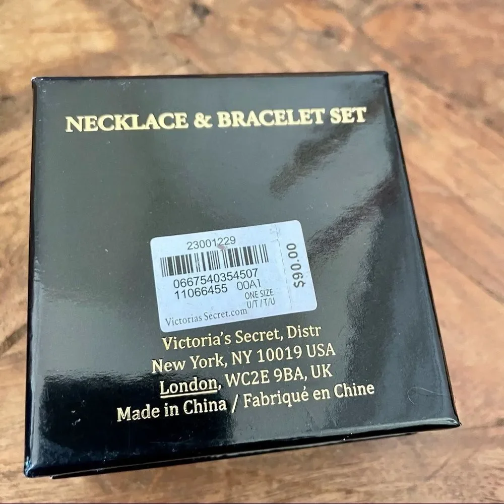 Victoria Secret gold tone necklace & bracelet set